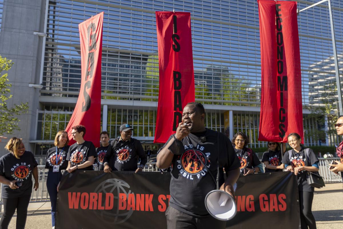 Gas is bad economics protest outside the World Bank building in Washington DC